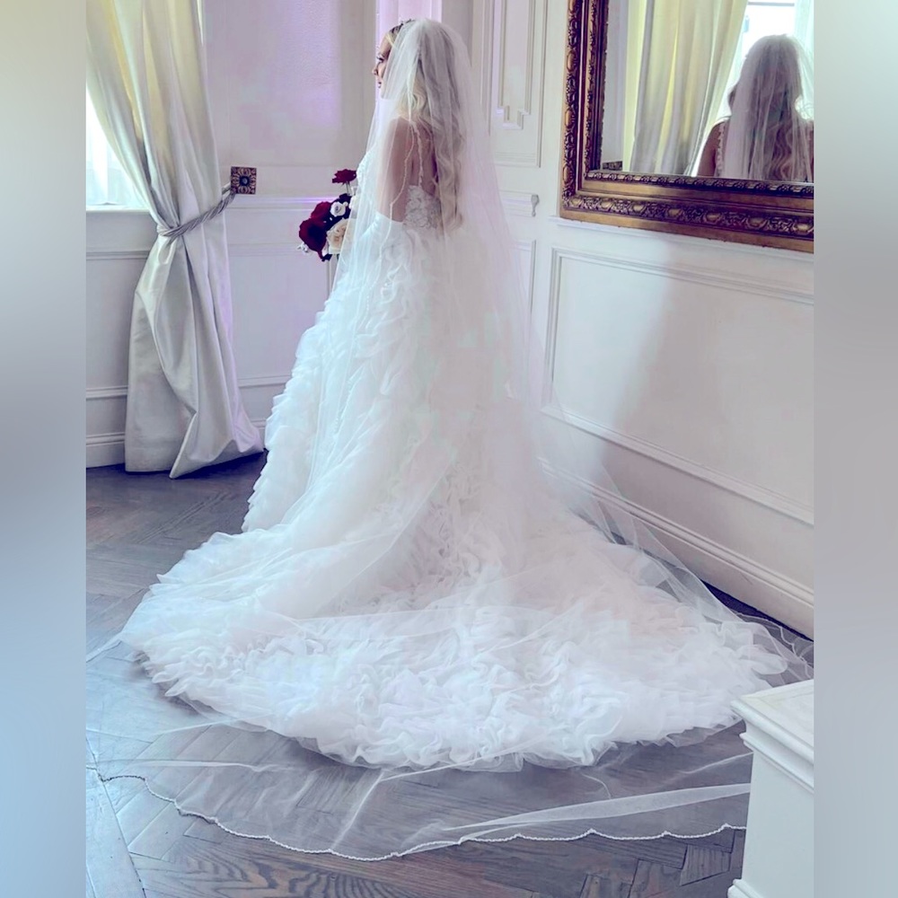 Like NEW Ivory cathedral length veil with crystal scalloped beading on the edge